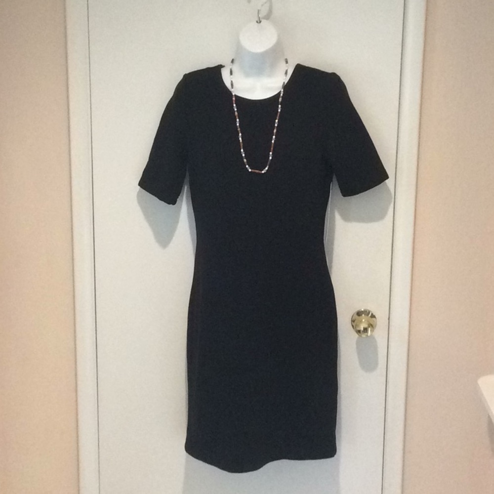 Black Mario Serrano slip on dress. Size XS